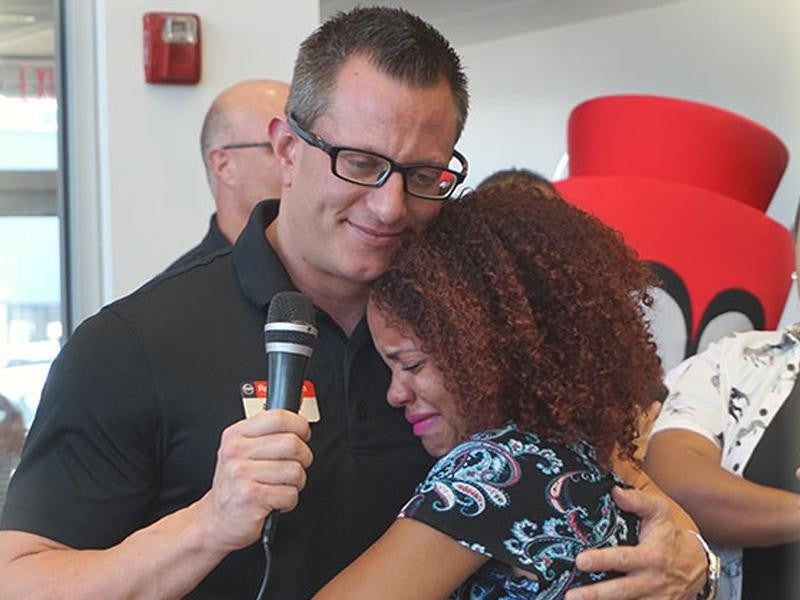 A man hugging a woman