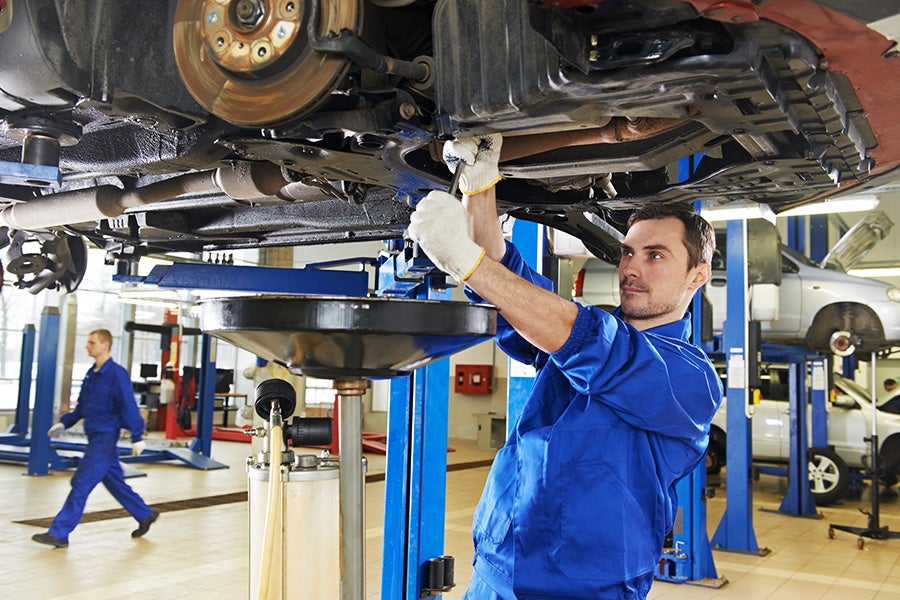 technician servicing car